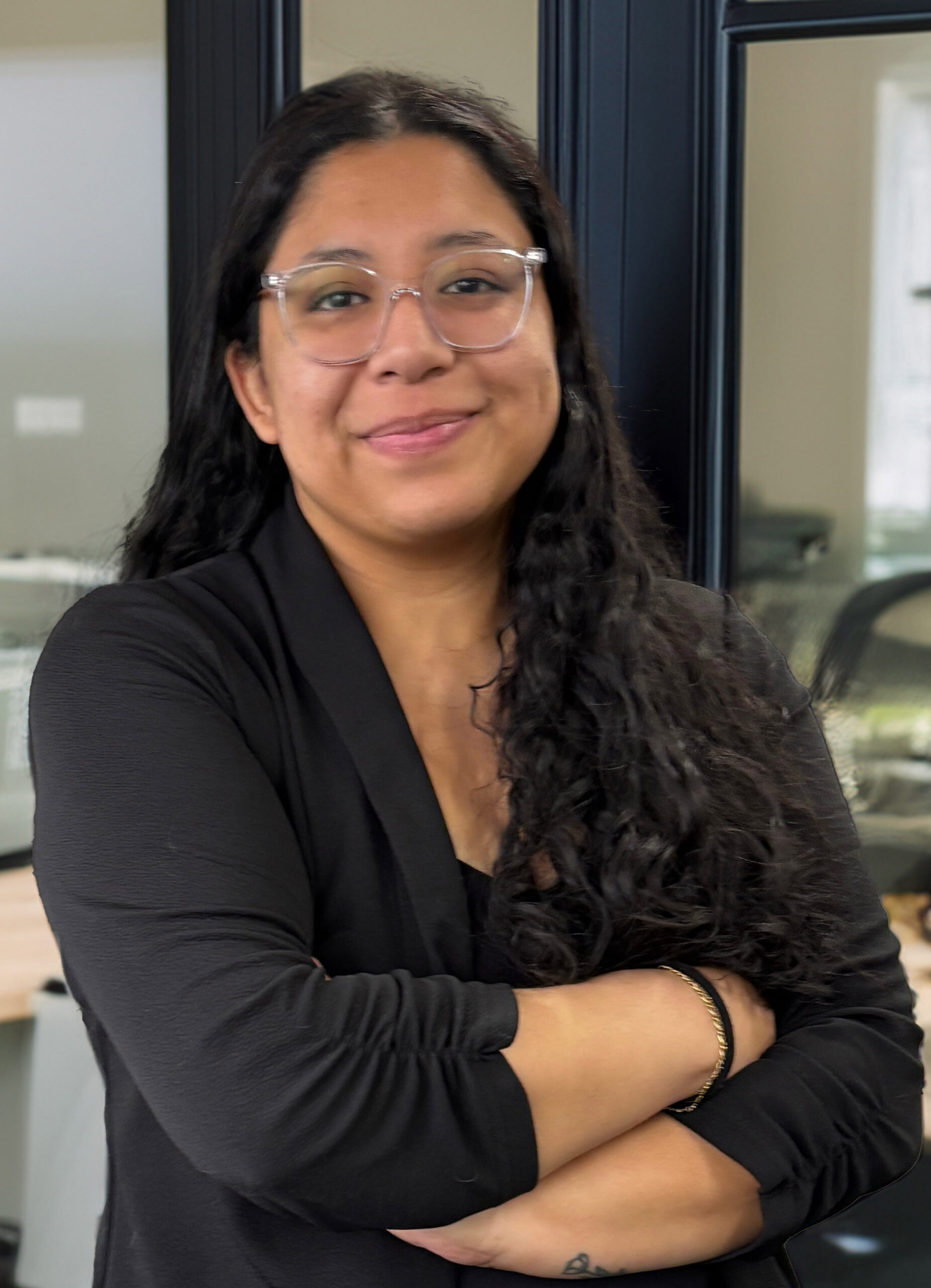 Picture of Airam Melendez, a woman who works at the Utah Department of Corrections.